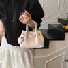 Bolsa de Balde Texturizada Versátil de Alta Qualidade para Mulheres - Moda de Verão Tendência 2025