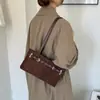 Bolso grande de mujer estilo retro, nuevo modelo de otoño 2026, bolso de hombro de alta gama para el día a día, bolso de axila moderno y versátil