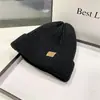 Sombrero estilo americano color block de invierno grueso cálido tejido de punto invierno para hombre protección para las orejas gorro para el frío gorro de lana cobertura para la cabeza moderno