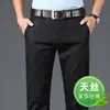 Pantalones Casuales Elásticos de Tencel Sin Planchar para Hombre Pantalones Nuevos Otoño Rectos Holgados Versátiles de Negocios Pantalones Largos de Seda Helada