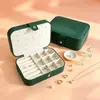 Caja de joyería portátil de stock de fábrica, caja de exhibición de accesorios de gran capacidad con espejo, caja de almacenamiento para aretes de oro, anillos y collares