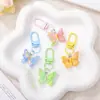 Llavero de mariposa de resina de colores dulces, colgante de hebilla de puerta, producto terminado creativo hecho a mano DIY, decoración de accesorio para bolso