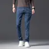 Jeans grises y azules de alta gama elegantes de Hong Kong para hombre, verano 2026, finos, corte slim, rectos, elásticos, versátiles.