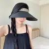 Nuevo sombrero de sol de ala ancha y copa abierta para mujer, sombrero de paja con recubrimiento negro de verano que hace que la cara se vea más pequeña, sombrero de sol versátil para salidas