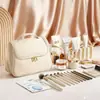 Bolsa de maquillaje de gran capacidad, estilo imitación Hua Yao, popular en línea, neceser portátil, estuche de maquillaje de viaje, venta al por mayor de fabricante de cosméticos