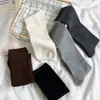 Calcetines altos para mujer estilo miu color liso versátiles calcetines largos otoño nuevo estilo estilo coreano simples ajustados calcetines jk sin costuras