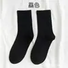 Calcetines de Moda de Color Sólido Nuevos para Mujer Pareja Calcetines de Running Deportivos Europeos y Americanos Calcetines de Ins Hombres de Caña Media Calcetines Largos de Otoño e Invierno