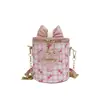 Bolso Cilíndrico con Lazo de Tablero de Ajedrez Fresco 2026 Nuevo Estilo Bolso Cruzado de Cadena Femenino Bolso de Hombro Casual Versátil
