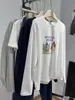 Nueva Camiseta de Algodón Puro de Manga Larga Estilo Hong Kong Súper Popular Otoño Moda Femenina Dulce y Picante Perezoso Interior Holgado Top Estampado