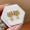 Pendientes de botón de plata con baño de oro real de 18 quilates, con aguja de plata, circonita y diseño único de oreja de gato, de lujo ligero y sensación de alta gama, al por mayor