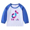 2026 Nueva Camiseta Infantil Transfronteriza de Primavera y Otoño Cuello Redondo Dibujos Animados Manga Larga Camiseta Básica para Niños y Niñas Camiseta de Algodón para Bebé