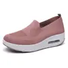 Zapatos slip-on de suela gruesa para mujer, zapatillas transpirables de malla fly-knit con amortiguación de aire que aumentan la altura, zapatos mecedora, zapatos casuales transpirables para mujer