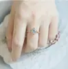 Anillo Versátil "Cruz Azul Francesa" Flor de Cruz Pura y de Alta Gama Alta Imitación Topacio Azul Transparente Natural Lujo Accesible