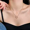 [Ciudad de Rizhao] Collar retro francés de rayos de sol con pedrería microincrustada y cadena para clavícula con tótem de sol romano para mujer