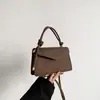 Bolsa de mão pequena para comércio exterior transfronteiriço para mulheres, novo estilo 2026, versátil, moderna e minimalista, bolsa de ombro, bolsa crossbody e pequena bolsa tote quadrada