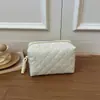 Bolsa de maquillaje minimalista estilo coreano con patrón de diamantes para mujer, bolsa de almacenamiento de cuidado de la piel portátil de gran capacidad con correa colgante tejida, neceser de mano