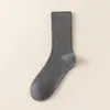 Calcetines de lana para hombre para otoño e invierno, engrosados para abrigar, simples, versátiles para negocios casual, color liso, de cachemira, de tubo largo