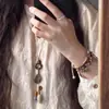 Nuevo Collar Largo con Borlas de Hoja Estilo Chino con un Estilo Nacional de Alta Gama y un Toque Bohemio, Cadena para Clavícula