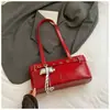 Verão 2025 Nova Moda Nicho Commuter Bolsa de Ombro Estilo Retrô Feminina Hot Girl Bolsa de Axila para Motociclista
