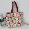 Bolsa de Lona Grande Capacidade de Ombro Único Feminina Original Bolsa de Mão Estudante Universitário Aula Bolsa Andy Loja de Fábrica Tashi Huaai Macio