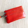 Carteira de moedas de couro bovino de primeira camada, porta-chaves de couro genuíno feminino, bolsa de pulso com zíper, carteira curta solta de couro bovino, atacado