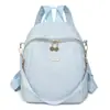 Mochila de Tela Oxford Nueva 2025 Mochila Textil Casual de Moda Combinable Simple para Exterior Bolsa de Viaje para Mujer