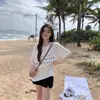 Camiseta de Manga Corta de Algodón Puro Blanca Estilo Retro Americano para Mujer Verano 2026 Nueva Camiseta Popular de Verano Holgada Talla Grande