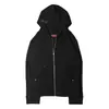Cárdigan con capucha y cremallera de color gris claro con logo en relieve, ojales dobles, bolsillos con remaches, corte holgado, estilo high street, chaqueta sudadera unisex