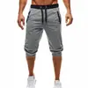 2018 desejo explosões de comércio exterior calças esportivas casuais europeias e americanas slim fitness combinação de cores cinco calças de corrida homens