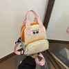 Bolso infantil de moda con bloques de colores inspirados en la dopamina, una mini mochila multifuncional para niños y niñas, perfecta para llevar objetos pequeños y monedas al salir