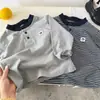Camiseta para niño, tallas para preescolar y bebé, nueva de 2026, top de manga larga a rayas para primavera y otoño, camiseta interior tipo polo de algodón puro para niños