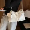 Bolso bandolera de hombro grande de moda casual para mujer, nuevo, con textura, cierre de cordón versátil 2026