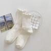 Medias color café Medias de longitud media para niños Otoño e Invierno Algodón Oreja de madera Medias de apilamiento Absorbentes de sudor Calcetines de encaje para universidad para mujer Zhuji