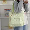 Bolsa de ombro e bolsa transversal de grande capacidade para alunos do ensino fundamental e médio, adequada para carregar livros para a aula, aulas de reforço e uso diário.; um design elegante e simples
