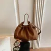 Bolsa de Couro Macio com Cordão Estilo Coreano Nova Retrô Bolsa de Mão Feminina para o Trabalho Bolsinha de Ombro Única de Nicho High-End
