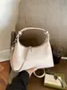 Bolso tipo dumpling para debajo del brazo exquisitamente tejido para mujer, nuevo modelo 2026, bolso de hombro texturizado y único, bolso cruzado versátil y moderno para el día a día