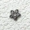 Accesorios de aleación de plata Xizang vintage exclusivos transfronterizos para manualidades Colgante de collar de palma europeo y americano Accesorios de joyería al por mayor