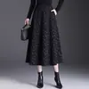 Falda midi de línea A con estampado floral retro para mujer, nueva colección otoño 2026, elegante y con estilo, con bajo acampanado, diseño de cintura alta y efecto adelgazante.