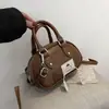 Otoño e Invierno Bolso Pequeño Retro para Mujer 2026 Nuevo Estilo Moda Versátil Bolso Cruzado Tacto de Alta Gama Bolso de Mano Tipo Bowling
