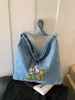 Bolso de hombro moderno y a la moda 2026 nuevo vintage versátil de gran capacidad bandolera para estudiantes, para ir al trabajo y para viajar bolso de mano