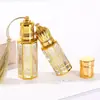 Nova Garrafa de Óleo Essencial Galvanizada, Garrafa de Vidro Octogonal, Alto Valor Estético, Garrafa de Vidro com Rolo Dourado para Óleo Essencial, Garrafa Portátil Reabastecível