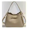 Bolso Pequeño de Alta Gama con Patrón de Lichi para Mujer 2026 Nuevo Bolso de Mano Versátil Bolso Cubo Elegante Estilo Commuter Bolso Cruzado