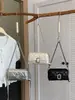 Bolso de cadena popular transfronterizo con patrón de rombos simples para mujer, nuevo bolso de hombro de moda de tendencia 2026, bolso cuadrado pequeño cruzado con estilo
