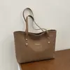 La popular bolsa de mano retro de este año para mujer, nuevo estilo Otoño 2026, color liso, simple, bolso de un solo hombro, para ir al trabajo, bolso de axila