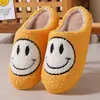 Zapatillas de algodón de cara sonriente y corazón de melocotón de invierno para mujer, zapatillas cálidas de felpa para el hogar en interiores, zapatillas arcoíris de venta cruzada, venta al por mayor