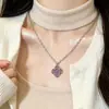 Collar clásico de trébol de cuatro hojas negro, una pieza delicada y elegante para mujer, un amuleto de la suerte que se puede usar con cualquier atuendo, perfecto para el uso diario y como regalo para tu novia o mejor amiga