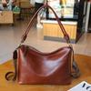 Bolso Balde de Cuero Vacuno de Flor Superior Curtido Vegetal 2024 Otoño e Invierno Nuevo Bolso Cruzado para Mujer Cuero Genuino Gran Capacidad Sensación de Clase Bolso de Mano