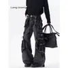 Jeans vintage lavados de marca de moda con dobladillo deshilachado para hombre, estilo visual punk, vibra de la alta calle americana, pantalones largos ligeramente acampanados de estilo workwear.