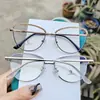 Nuevo negocio metal diamante ceja miopía marco de gafas moda viajero ojo de gato luz azul anti-reflejo plano