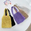 Bolso de Mano Tejido Versátil Primavera/Verano 2026 Bolso Hueco para Mujer Bolso de Punto Nuevo de Moda Estilo Ins Bolso de Playa